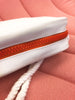 vintage courreges bag with orange zipper detail plaisir palace